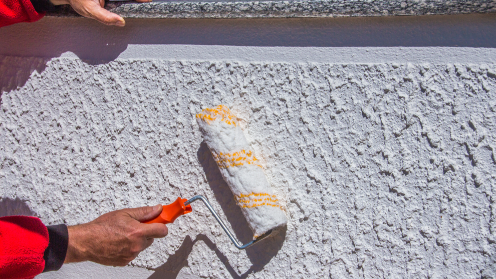 Eine Fassade wird gestrichen Eine Fassade wird gestrichen